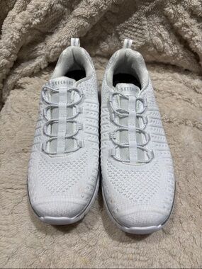 Skechers All-White Knit Slip-On Trainers